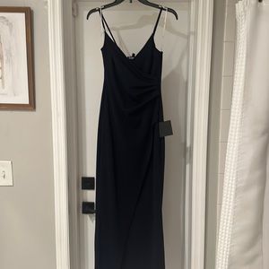 Selling this long navy formal dress. Super cute and flattering.